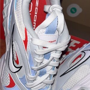 Nike White and Red Sneakers with Blue Accents